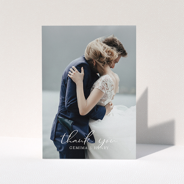A wedding thank you card template titled "Classic Thank You". It is an A5 card in a portrait orientation. It is a photographic wedding thank you card with room for 1 photo. "Classic Thank You" is available as a folded card, with mainly white colouring.