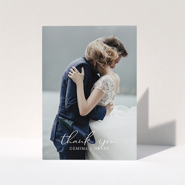 A wedding thank you card template titled "Classic Thank You". It is an A6 card in a portrait orientation. It is a photographic wedding thank you card with room for 1 photo. "Classic Thank You" is available as a folded card, with mainly white colouring.