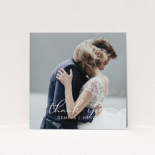 A wedding thank you card called "Classic Thank You". It is a square (148mm x 148mm) card in a square orientation. It is a photographic wedding thank you card with room for 1 photo. "Classic Thank You" is available as a flat card, with mainly white colouring.