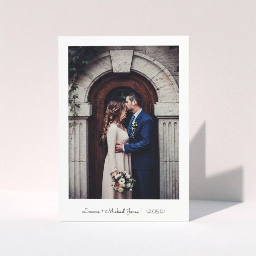 A wedding thank you card design called "Classic Thank You with Photo". It is an A5 card in a portrait orientation. It is a photographic wedding thank you card with room for 1 photo. "Classic Thank You with Photo" is available as a folded card, with mainly white colouring.