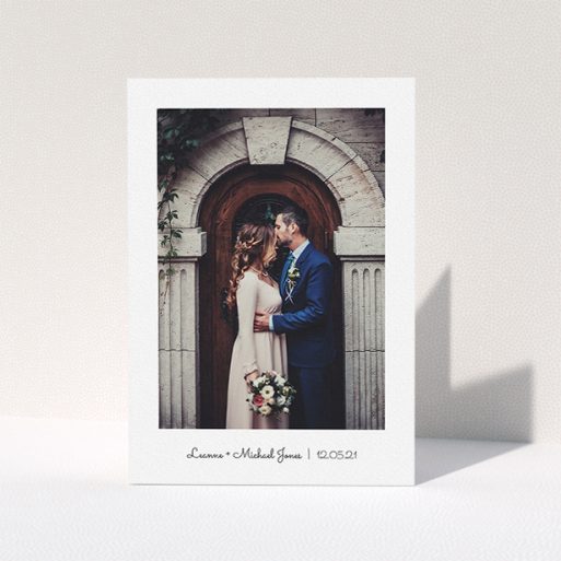 A wedding thank you card design called "Classic Thank You with Photo". It is an A5 card in a portrait orientation. It is a photographic wedding thank you card with room for 1 photo. "Classic Thank You with Photo" is available as a folded card, with mainly white colouring.