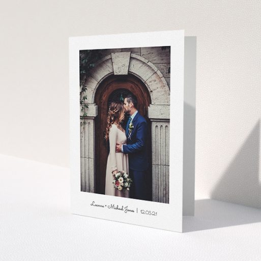 A wedding thank you card design called 'Classic Thank You with Photo'. It is an A5 card in a portrait orientation. It is a photographic wedding thank you card with room for 1 photo. 'Classic Thank You with Photo' is available as a folded card, with mainly white colouring.