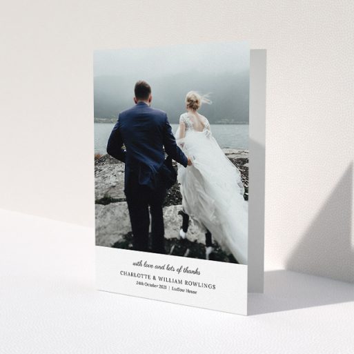 A wedding thank you card template titled 'Classic Wedding Thanks'. It is an A5 card in a portrait orientation. It is a photographic wedding thank you card with room for 1 photo. 'Classic Wedding Thanks' is available as a folded card, with mainly white colouring.