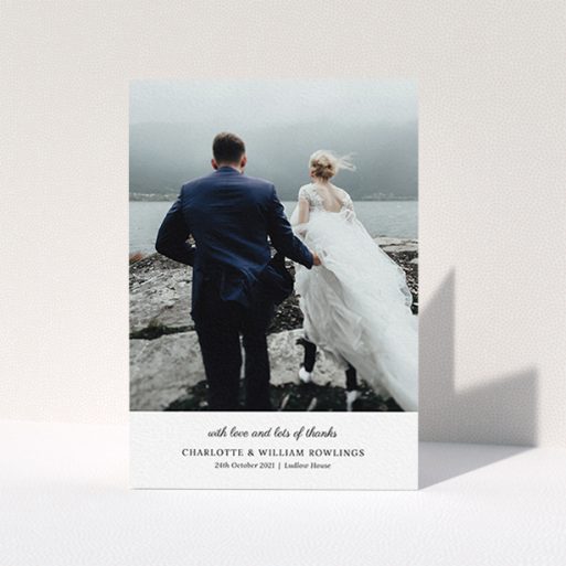A wedding thank you card called "Classic Wedding Thanks". It is an A6 card in a portrait orientation. It is a photographic wedding thank you card with room for 1 photo. "Classic Wedding Thanks" is available as a folded card, with mainly white colouring.