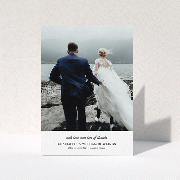 A wedding thank you card called "Classic Wedding Thanks". It is an A6 card in a portrait orientation. It is a photographic wedding thank you card with room for 1 photo. "Classic Wedding Thanks" is available as a folded card, with mainly white colouring.