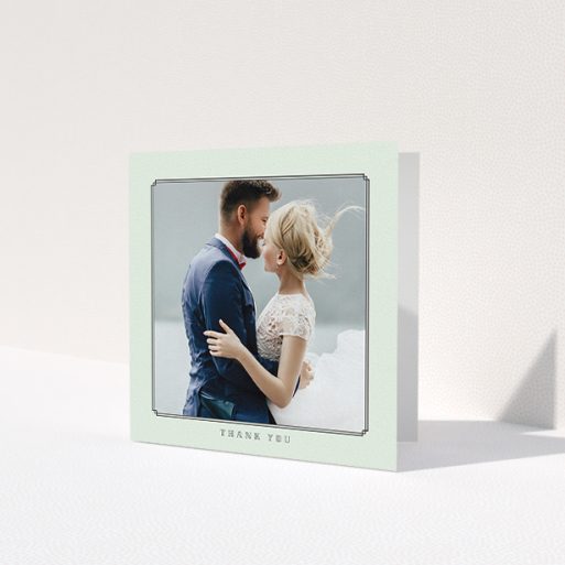 A wedding thank you card design called 'Deco mint'. It is a square (148mm x 148mm) card in a square orientation. It is a photographic wedding thank you card with room for 1 photo. 'Deco mint' is available as a folded card, with mainly green colouring.
