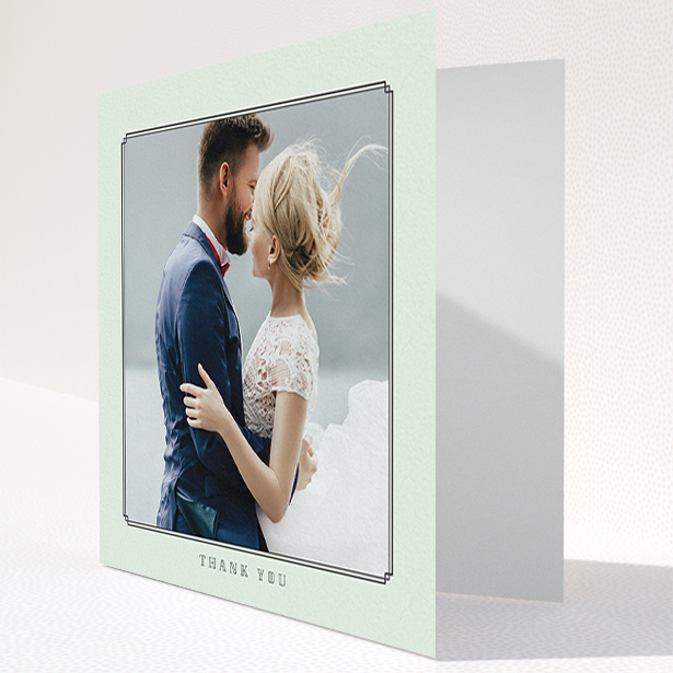 A wedding thank you card design called "Deco mint". It is a square (148mm x 148mm) card in a square orientation. It is a photographic wedding thank you card with room for 1 photo. "Deco mint" is available as a folded card, with mainly green colouring.