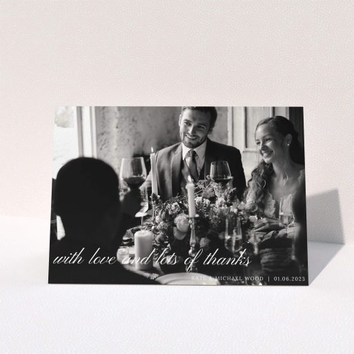 A wedding thank you card called "Elegant Photo Thanks". It is an A5 card in a landscape orientation. It is a photographic wedding thank you card with room for 1 photo. "Elegant Photo Thanks" is available as a folded card, with mainly white colouring.