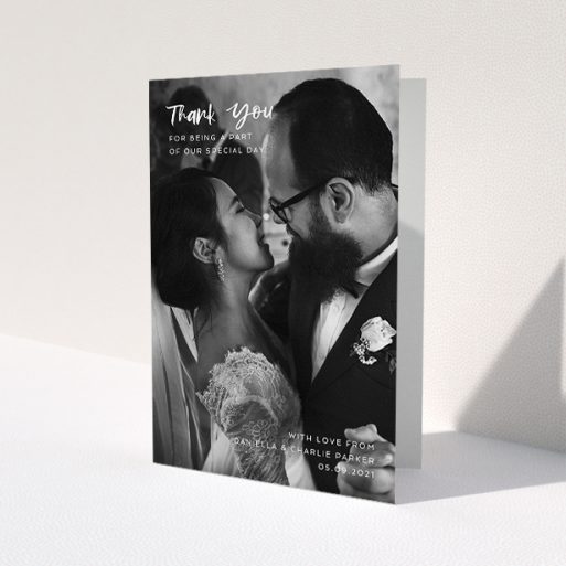 A wedding thank you card design named 'Front Cover'. It is an A5 card in a portrait orientation. It is a photographic wedding thank you card with room for 1 photo. 'Front Cover' is available as a folded card, with mainly white colouring.