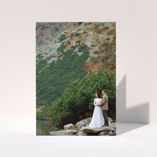 A wedding thank you card design called "Intro-Thanks-Photo". It is an A5 card in a portrait orientation. It is a photographic wedding thank you card with room for 1 photo. "Intro-Thanks-Photo" is available as a folded card, with mainly white colouring.