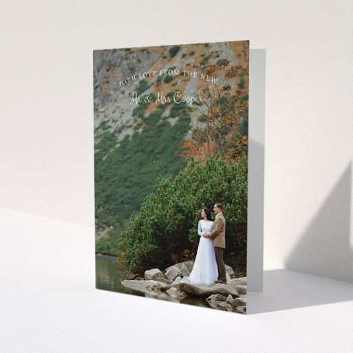 A wedding thank you card design called 'Intro-Thanks-Photo'. It is an A5 card in a portrait orientation. It is a photographic wedding thank you card with room for 1 photo. 'Intro-Thanks-Photo' is available as a folded card, with mainly white colouring.