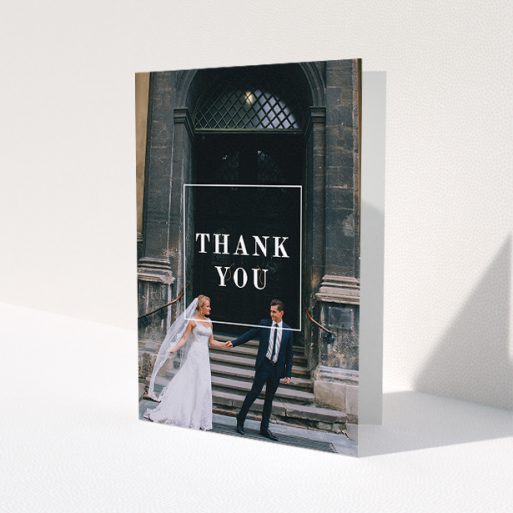 A wedding thank you card template titled 'Just the outline'. It is an A5 card in a portrait orientation. It is a photographic wedding thank you card with room for 1 photo. 'Just the outline' is available as a folded card, with mainly white colouring.