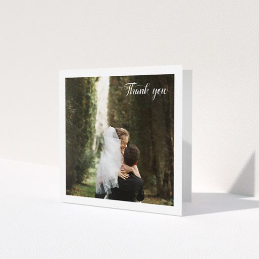 A wedding thank you card template titled 'Just the two of us'. It is a square (148mm x 148mm) card in a square orientation. It is a photographic wedding thank you card with room for 1 photo. 'Just the two of us' is available as a folded card, with mainly white colouring.