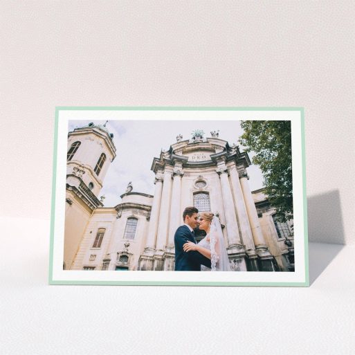 Wedding Thank You Card Design - "Light Green Border" A wedding thank you card design called "Light Green Border". It is an A5 card in a landscape orientation. It is a photographic wedding thank you card with room for 1 photo. "Light Green Border" is available as a folded card, with tones of green and white.