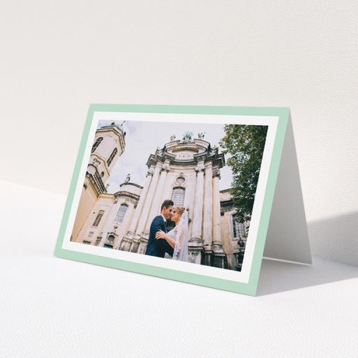 A wedding thank you card design called 'Light Green Border'. It is an A5 card in a landscape orientation. It is a photographic wedding thank you card with room for 1 photo. 'Light Green Border' is available as a folded card, with tones of green and white.