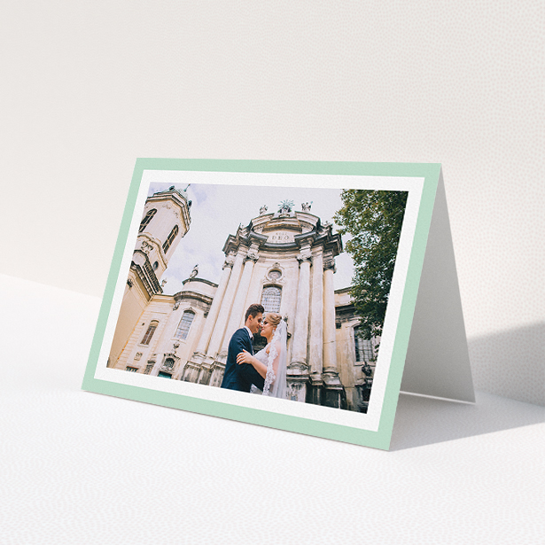 A wedding thank you card design called "Light Green Border". It is an A5 card in a landscape orientation. It is a photographic wedding thank you card with room for 1 photo. "Light Green Border" is available as a folded card, with tones of green and white.