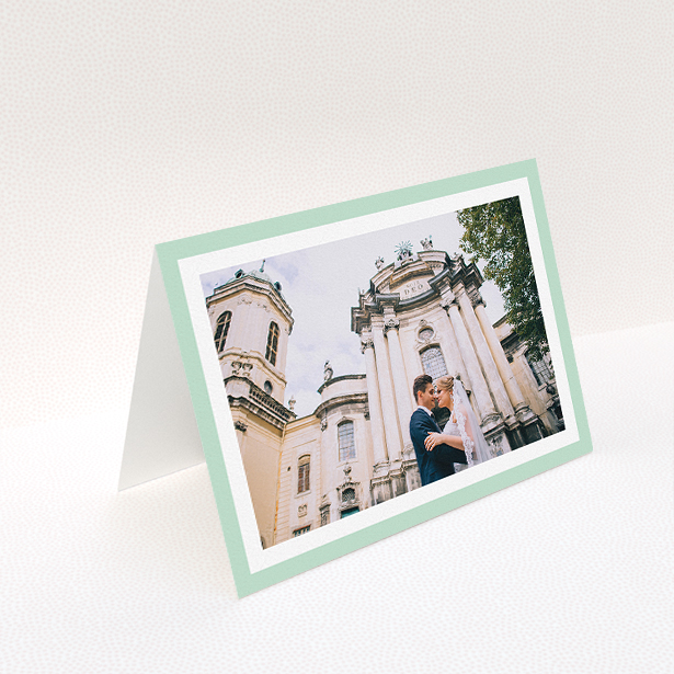 A wedding thank you card design called "Light Green Border". It is an A5 card in a landscape orientation. It is a photographic wedding thank you card with room for 1 photo. "Light Green Border" is available as a folded card, with tones of green and white.