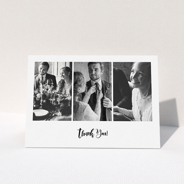 A wedding thank you card design titled "Modern Tryptic". It is an A5 card in a landscape orientation. It is a photographic wedding thank you card with room for 3 photos. "Modern Tryptic" is available as a folded card, with mainly white colouring.