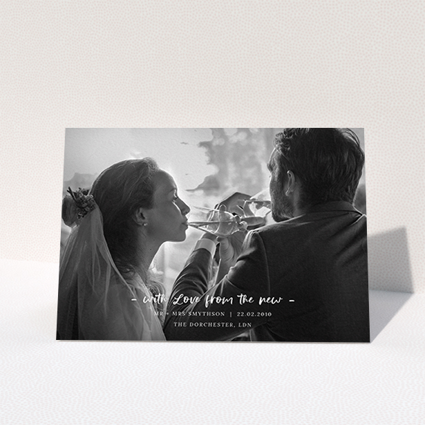 A wedding thank you card design called "Modern Wedding Photography". It is an A6 card in a landscape orientation. It is a photographic wedding thank you card with room for 1 photo. "Modern Wedding Photography" is available as a folded card, with mainly white colouring.