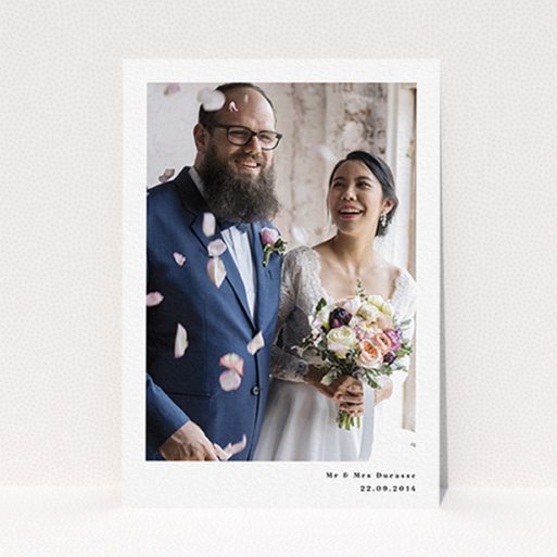 A wedding thank you card called "Most of the page". It is an A6 card in a portrait orientation. It is a photographic wedding thank you card with room for 1 photo. "Most of the page" is available as a flat card, with mainly white colouring.