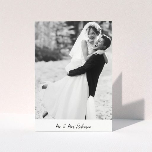 A wedding thank you card design titled "Mr & Mrs Footer". It is an A5 card in a portrait orientation. It is a photographic wedding thank you card with room for 1 photo. "Mr & Mrs Footer" is available as a folded card, with mainly white colouring.
