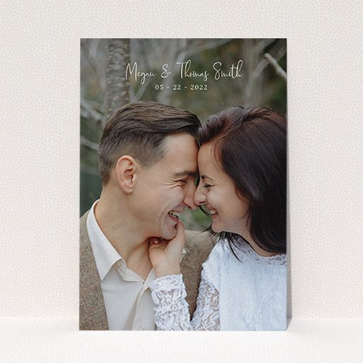 A wedding thank you card called "Name-Date-Photo". It is an A6 card in a portrait orientation. It is a photographic wedding thank you card with room for 1 photo. "Name-Date-Photo" is available as a flat card, with mainly white colouring.