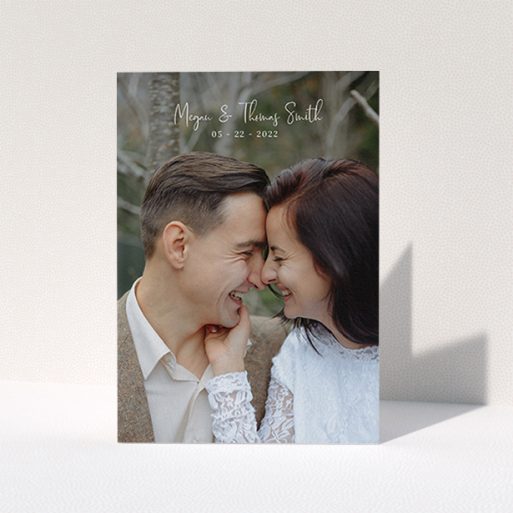 A wedding thank you card template titled "Name-Date-Photo". It is an A6 card in a portrait orientation. It is a photographic wedding thank you card with room for 1 photo. "Name-Date-Photo" is available as a folded card, with mainly white colouring.
