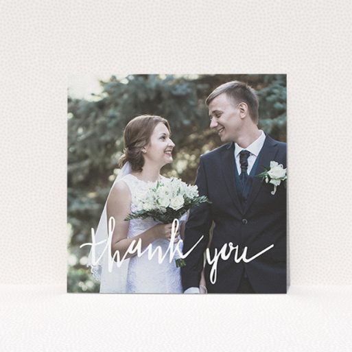 A wedding thank you card template titled "New to calligraphy". It is a square (148mm x 148mm) card in a square orientation. It is a photographic wedding thank you card with room for 1 photo. "New to calligraphy" is available as a flat card, with mainly white colouring.