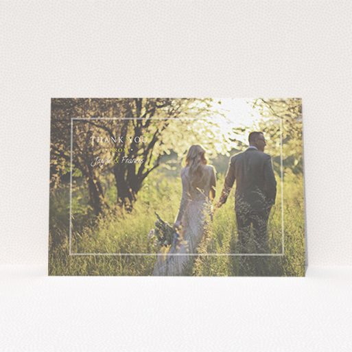 A wedding thank you card design called "Not even there". It is an A6 card in a landscape orientation. It is a photographic wedding thank you card with room for 1 photo. "Not even there" is available as a flat card, with mainly white colouring.