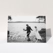 A wedding thank you card template titled "One Photo". It is an A5 card in a landscape orientation. It is a photographic wedding thank you card with room for 1 photo. "One Photo" is available as a folded card, with mainly white colouring.
