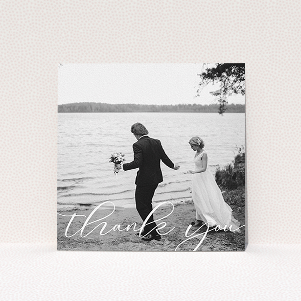 A wedding thank you card design named "One Photo". It is a square (148mm x 148mm) card in a square orientation. It is a photographic wedding thank you card with room for 1 photo. "One Photo" is available as a flat card, with mainly white colouring.