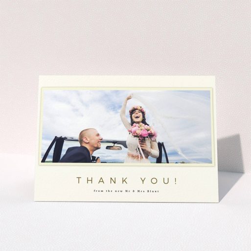 A wedding thank you card called "One white Polaroid ". It is an A5 card in a landscape orientation. It is a photographic wedding thank you card with room for 1 photo. "One white Polaroid " is available as a folded card, with mainly cream colouring.