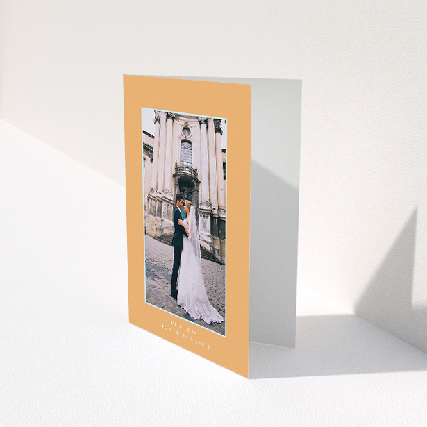 A wedding thank you card design called "Orange and blue". It is an A5 card in a portrait orientation. It is a photographic wedding thank you card with room for 1 photo. "Orange and blue" is available as a folded card, with tones of orange and blue.