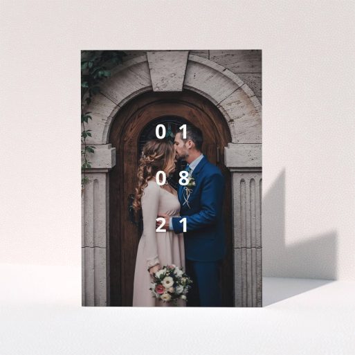 A wedding thank you card called "Our Date". It is an A5 card in a portrait orientation. It is a photographic wedding thank you card with room for 1 photo. "Our Date" is available as a folded card, with mainly white colouring.