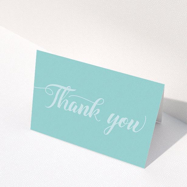 A wedding thank you card template titled "Pastel blue calligraphy". It is an A5 card in a landscape orientation. "Pastel blue calligraphy" is available as a folded card, with mainly blue colouring.
