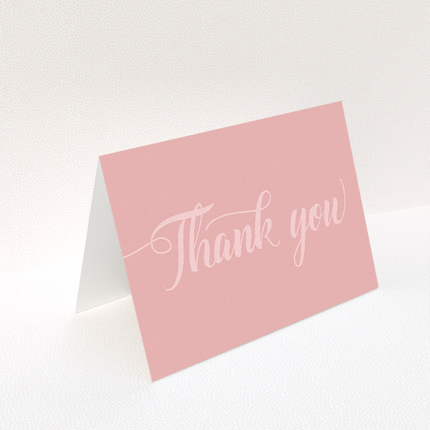 A wedding thank you card design called "Pastel pink calligraphy". It is an A5 card in a landscape orientation. "Pastel pink calligraphy" is available as a folded card, with mainly pink colouring.