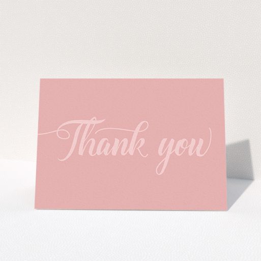 A wedding thank you card design titled "Pastel pink calligraphy". It is an A6 card in a landscape orientation. "Pastel pink calligraphy" is available as a folded card, with mainly pink colouring.
