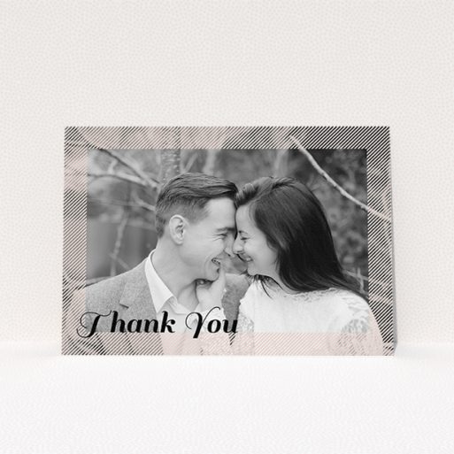 A wedding thank you card design named "Peach Over-Frame". It is an A5 card in a landscape orientation. It is a photographic wedding thank you card with room for 1 photo. "Peach Over-Frame" is available as a flat card, with mainly light pink colouring.