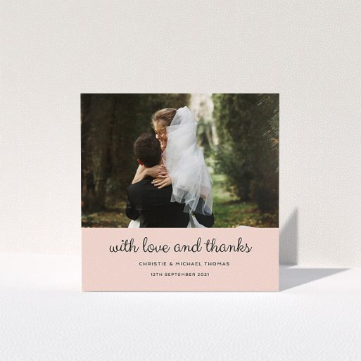 A wedding thank you card called "Pink Footer". It is a square (148mm x 148mm) card in a square orientation. It is a photographic wedding thank you card with room for 1 photo. "Pink Footer" is available as a folded card, with mainly pink colouring.