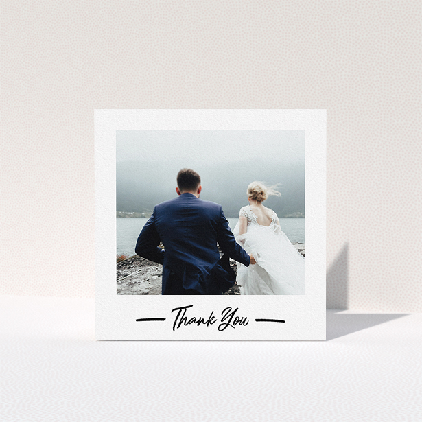 A wedding thank you card called "Portrait Thank You Photo". It is a square (148mm x 148mm) card in a square orientation. It is a photographic wedding thank you card with room for 1 photo. "Portrait Thank You Photo" is available as a folded card, with mainly white colouring.