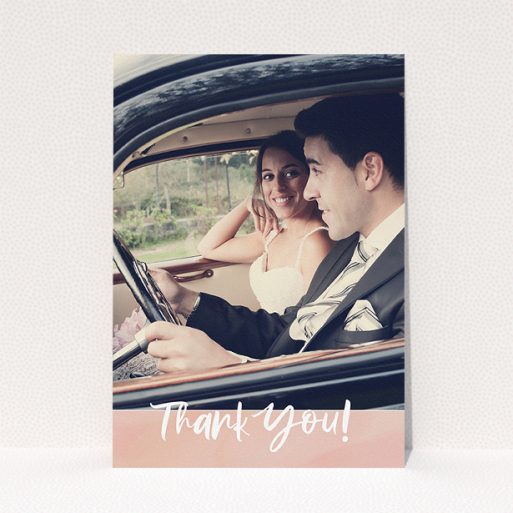 A wedding thank you card named "Pretty on Pink". It is an A5 card in a portrait orientation. It is a photographic wedding thank you card with room for 1 photo. "Pretty on Pink" is available as a flat card, with tones of pink and white.