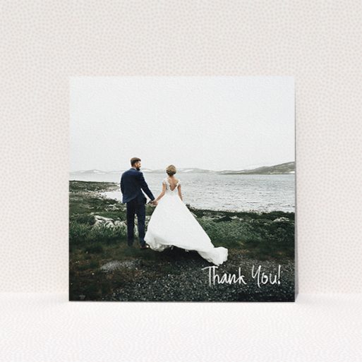 A wedding thank you card design named "Rough but Simple Photo". It is a square (148mm x 148mm) card in a square orientation. It is a photographic wedding thank you card with room for 1 photo. "Rough but Simple Photo" is available as a flat card, with mainly white colouring.