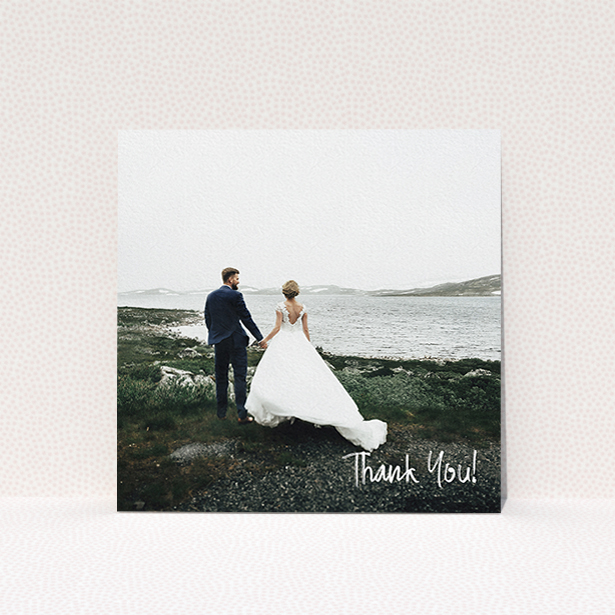 A wedding thank you card design named "Rough but Simple Photo". It is a square (148mm x 148mm) card in a square orientation. It is a photographic wedding thank you card with room for 1 photo. "Rough but Simple Photo" is available as a flat card, with mainly white colouring.