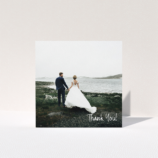 A wedding thank you card design titled "Rough but Simple Photo". It is a square (148mm x 148mm) card in a square orientation. It is a photographic wedding thank you card with room for 1 photo. "Rough but Simple Photo" is available as a folded card, with mainly white colouring.