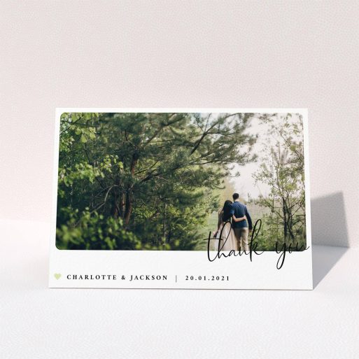 A wedding thank you card design called "Rounded-Off with Thanks". It is an A6 card in a landscape orientation. It is a photographic wedding thank you card with room for 1 photo. "Rounded-Off with Thanks" is available as a folded card, with mainly white colouring.