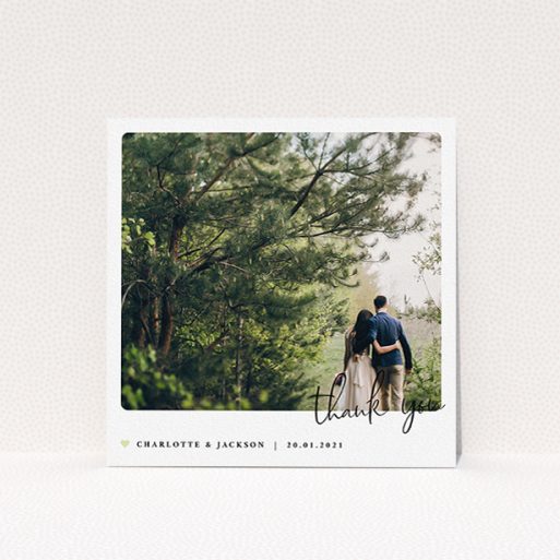 A wedding thank you card design titled "Rounded-Off with Thanks". It is a square (148mm x 148mm) card in a square orientation. It is a photographic wedding thank you card with room for 1 photo. "Rounded-Off with Thanks" is available as a flat card, with mainly white colouring.