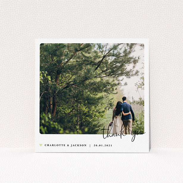 A wedding thank you card design titled "Rounded-Off with Thanks". It is a square (148mm x 148mm) card in a square orientation. It is a photographic wedding thank you card with room for 1 photo. "Rounded-Off with Thanks" is available as a flat card, with mainly white colouring.