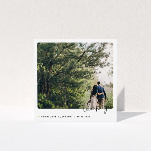 A wedding thank you card called "Rounded-Off with Thanks". It is a square (148mm x 148mm) card in a square orientation. It is a photographic wedding thank you card with room for 1 photo. "Rounded-Off with Thanks" is available as a folded card, with mainly white colouring.