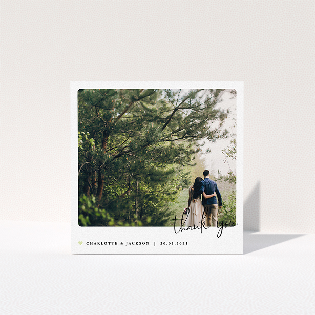 A wedding thank you card called "Rounded-Off with Thanks". It is a square (148mm x 148mm) card in a square orientation. It is a photographic wedding thank you card with room for 1 photo. "Rounded-Off with Thanks" is available as a folded card, with mainly white colouring.