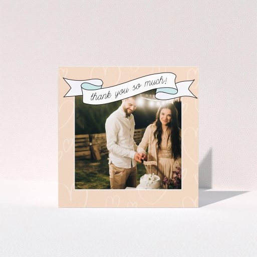 A wedding thank you card named "Rustic Thank You". It is a square (148mm x 148mm) card in a square orientation. It is a photographic wedding thank you card with room for 1 photo. "Rustic Thank You" is available as a folded card, with tones of faded yellow and light blue.
